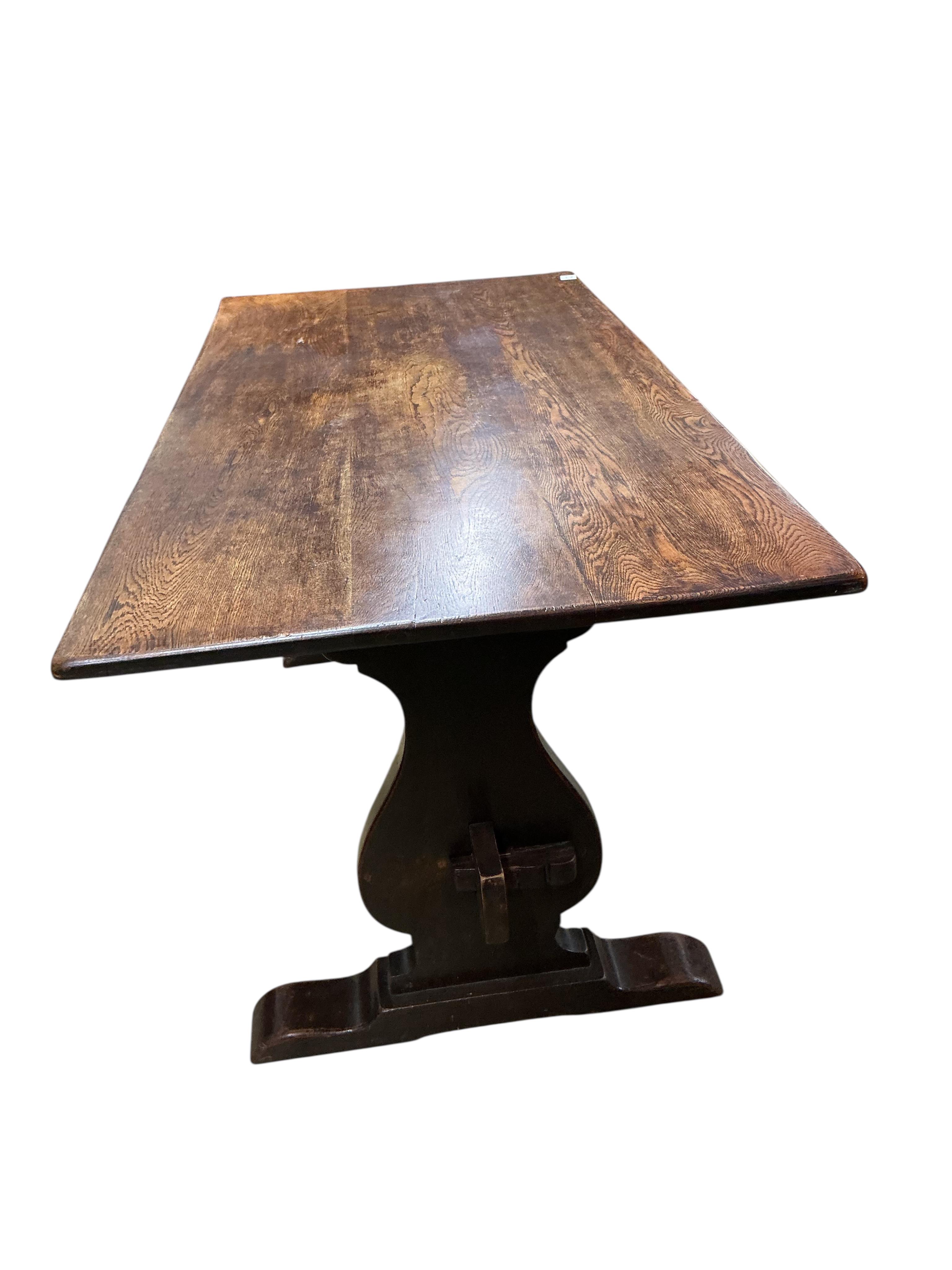 An 18th century style rectangular oak refectory dining table, width 150cm, depth 74cm, height 74cm